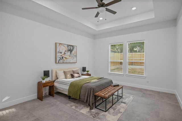 510 Woodrow Ave, Fort Worth, TX 76105 - bedroom with recessed lighting, a tray ceiling, and a ceiling fan