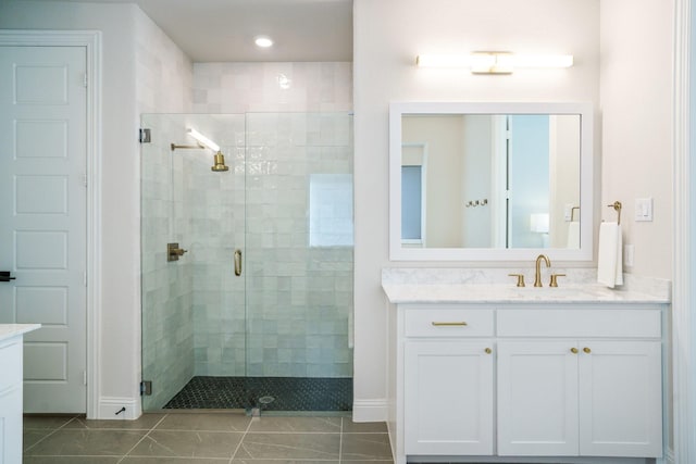3915 Lochwood Dr, Rowlett, TX 75088 - full bathroom featuring vanity, a shower stall, and tile patterned flooring
