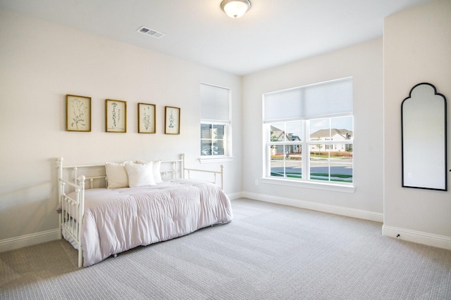 3915 Lochwood Dr, Rowlett, TX 75088 - carpeted bedroom featuring baseboards