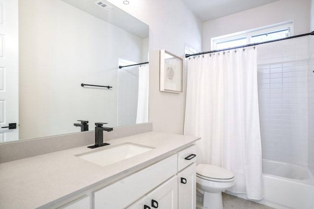 3915 Lochwood Dr, Rowlett, TX 75088 - bathroom featuring vanity, shower / bath combo with shower curtain, and tile patterned flooring