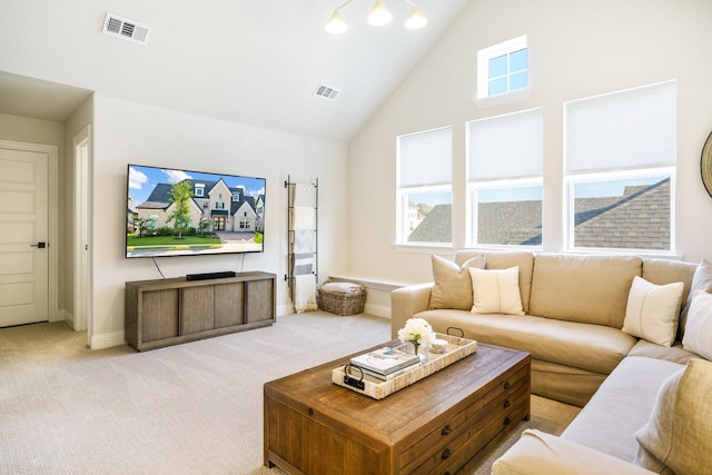 3915 Lochwood Dr, Rowlett, TX 75088 - living room with light carpet and high vaulted ceiling