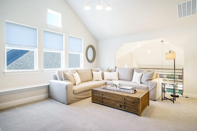 3915 Lochwood Dr, Rowlett, TX 75088 - living room with carpet floors, plenty of natural light, and high vaulted ceiling