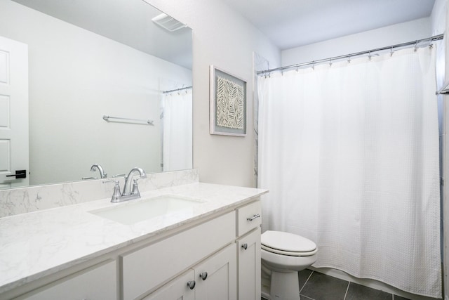 3915 Lochwood Dr, Rowlett, TX 75088 - bathroom with vanity, tile patterned floors, and a shower with curtain