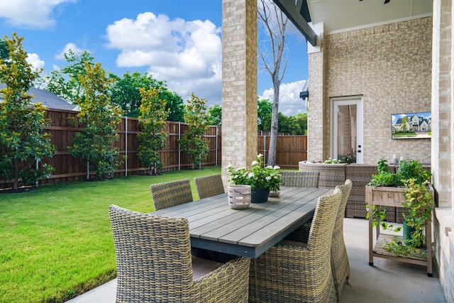 3915 Lochwood Dr, Rowlett, TX 75088 - fenced backyard featuring outdoor dining space and a patio