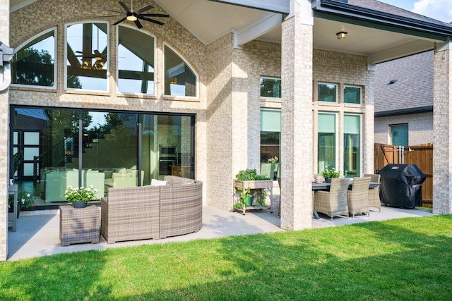 3915 Lochwood Dr, Rowlett, TX 75088 - back of property featuring an outdoor living space, a patio area, and ceiling fan