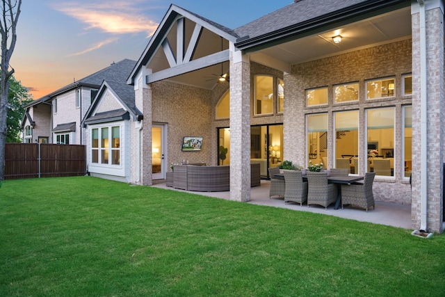 3915 Lochwood Dr, Rowlett, TX 75088 - rear view of property featuring a patio, outdoor lounge area, a shingled roof, and a ceiling fan