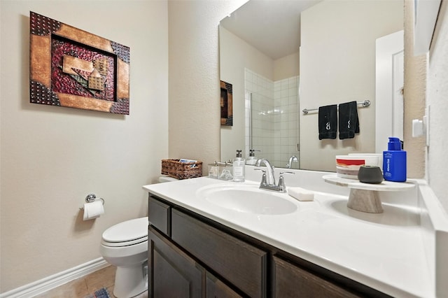 2711 Fleur De Lis Ln, Grand Prairie, TX 75054 - bathroom with vanity, tiled shower, and tile patterned floors