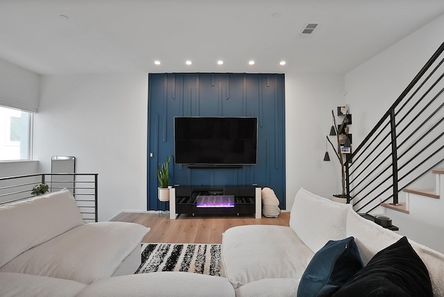 2001 N Prairie Ave Unit 106, Dallas, TX 75204 - living area with wood finished floors and recessed lighting