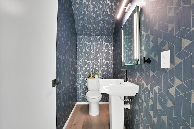 2001 N Prairie Ave Unit 106, Dallas, TX 75204 - half bath with toilet and wood finished floors
