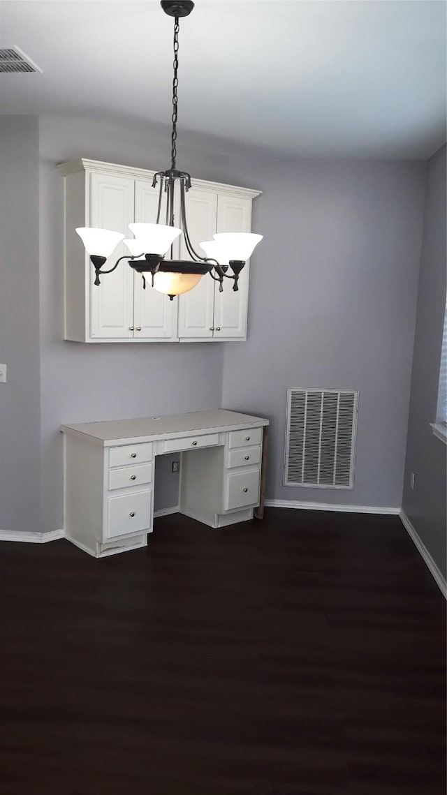 2017 Greenfield Ln, Allen, TX 75013 - unfurnished office featuring built in desk and dark wood finished floors