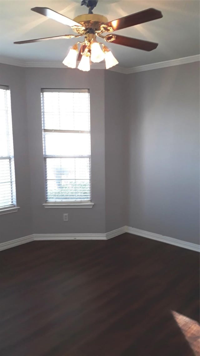 2017 Greenfield Ln, Allen, TX 75013 - unfurnished room featuring dark wood-style flooring, healthy amount of natural light, ceiling fan, and ornamental molding