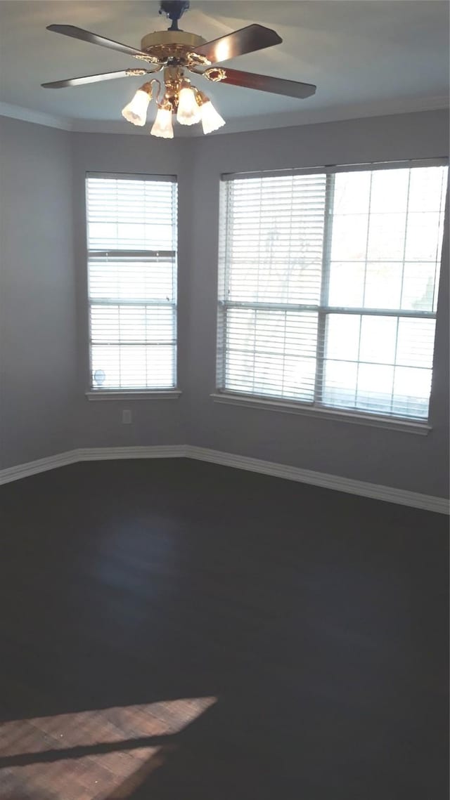 2017 Greenfield Ln, Allen, TX 75013 - empty room featuring a ceiling fan, ornamental molding, and wood finished floors