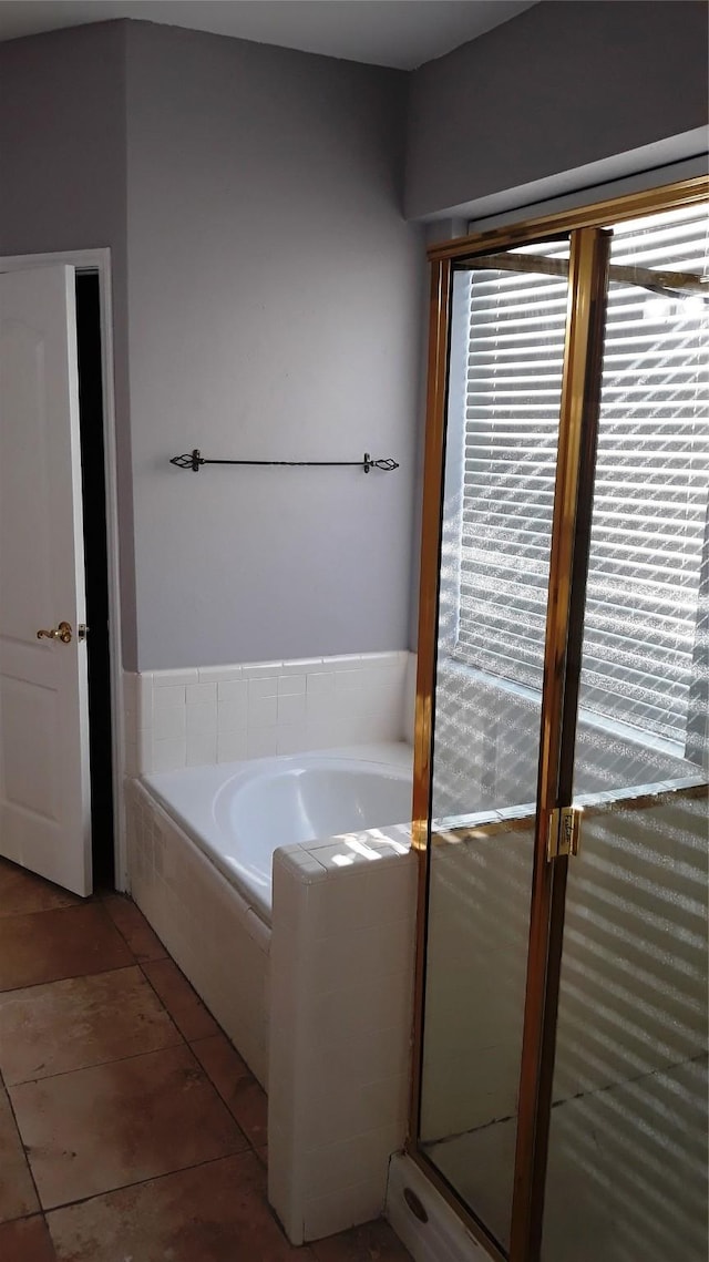 2017 Greenfield Ln, Allen, TX 75013 - bathroom featuring a bath and tile patterned floors