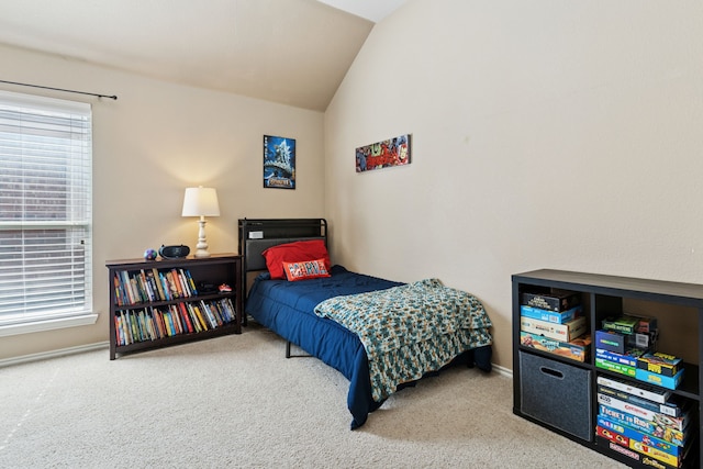 2020 El Camino Dr, Fort Worth, TX 76177 - carpeted bedroom with lofted ceiling and baseboards