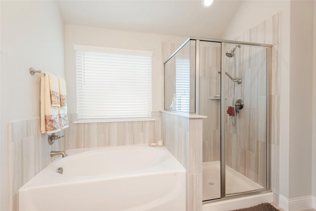 873 Mildren Ln, Fate, TX 75087 - bathroom with a garden tub, a shower stall, and vaulted ceiling