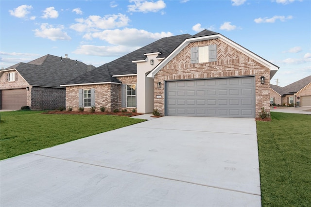 5608 Tall Pines Way, Shreveport, LA 71129 - french country home with concrete driveway, a front lawn, an attached garage, and brick siding