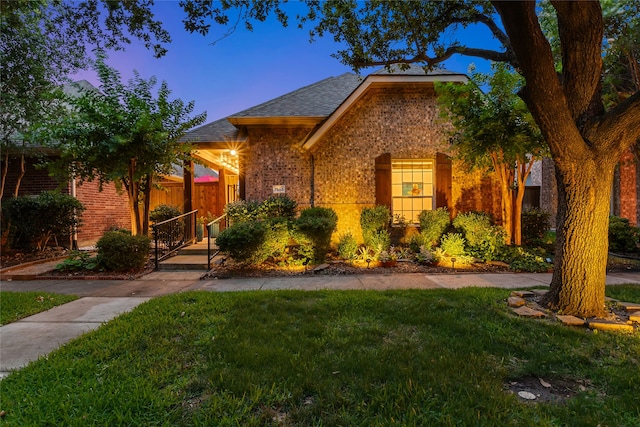 7585 Glasshouse Walk, Frisco, TX 75035 - view of front of property with brick siding and a shingled roof