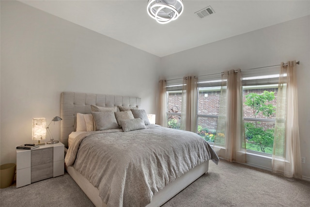 7585 Glasshouse Walk, Frisco, TX 75035 - bedroom with light colored carpet and multiple windows