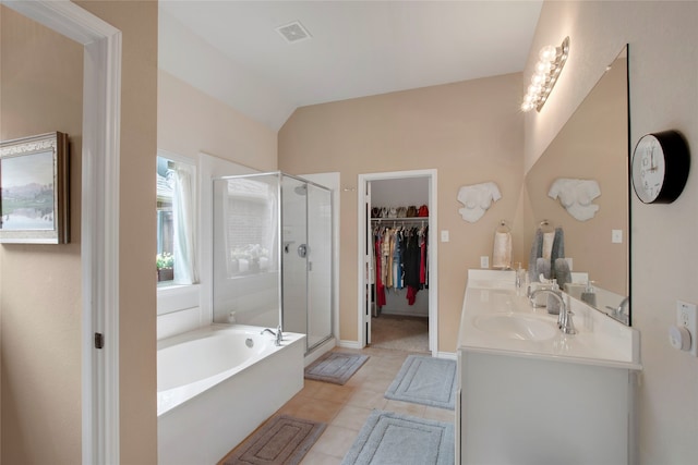 7585 Glasshouse Walk, Frisco, TX 75035 - full bath featuring a shower stall, a bath, double vanity, a spacious closet, and tile patterned floors