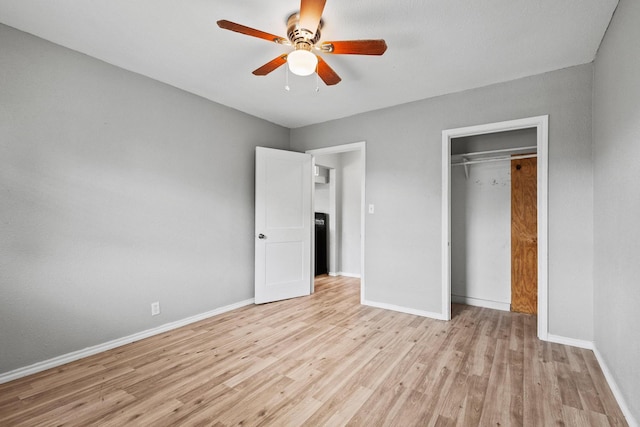 701 W Hull St Unit 101-2, Denison, TX 75020 - unfurnished bedroom featuring light wood-type flooring, a closet, and a ceiling fan
