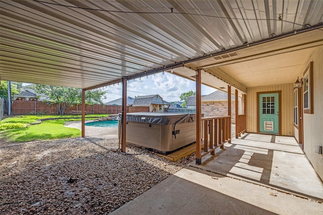 617 Ruth Dr, Kennedale, TX 76060 - fenced backyard with a hot tub and a patio