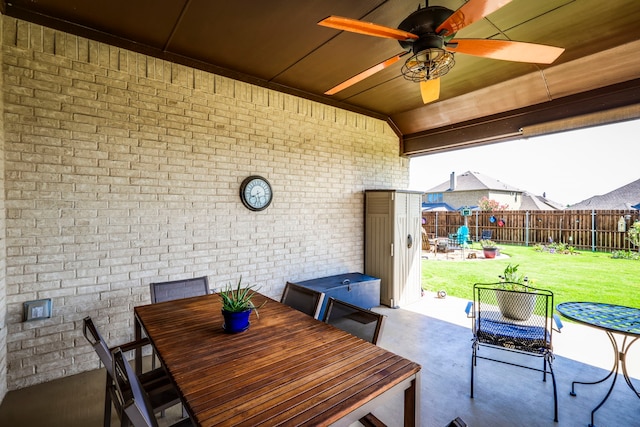 3238 Brighton Dr, Midlothian, TX 76065 - fenced backyard with a patio, a ceiling fan, and outdoor dining space