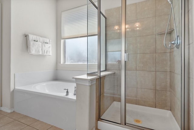 9324 Shadowfax Dr, Arlington, TX 76002 - bathroom with a garden tub, a stall shower, and tile patterned floors