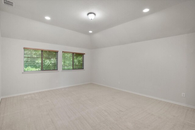 9324 Shadowfax Dr, Arlington, TX 76002 - empty room featuring light carpet, recessed lighting, and lofted ceiling