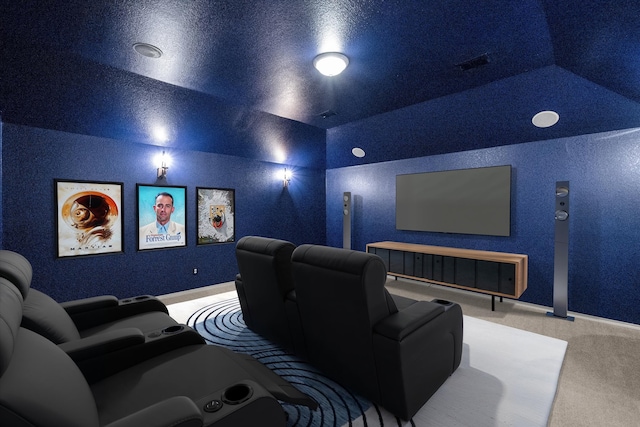 9324 Shadowfax Dr, Arlington, TX 76002 - carpeted home theater room featuring vaulted ceiling