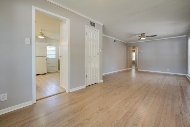 2442 Oates Dr, Dallas, TX 75228 - empty room with a ceiling fan, ornamental molding, and light wood finished floors