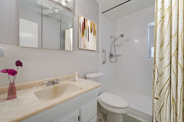 2442 Oates Dr, Dallas, TX 75228 - full bath featuring a shower with curtain, vanity, tile walls, a ceiling fan, and backsplash