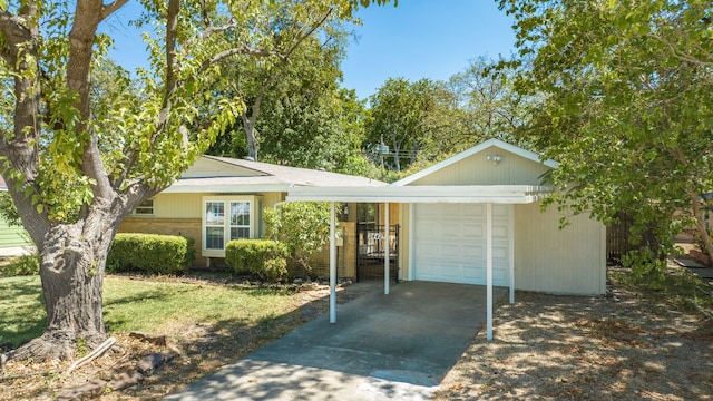 2442 Oates Dr, Dallas, TX 75228 - ranch-style house featuring concrete driveway and a garage