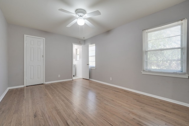 2442 Oates Dr, Dallas, TX 75228 - unfurnished room with light wood-style flooring and a ceiling fan