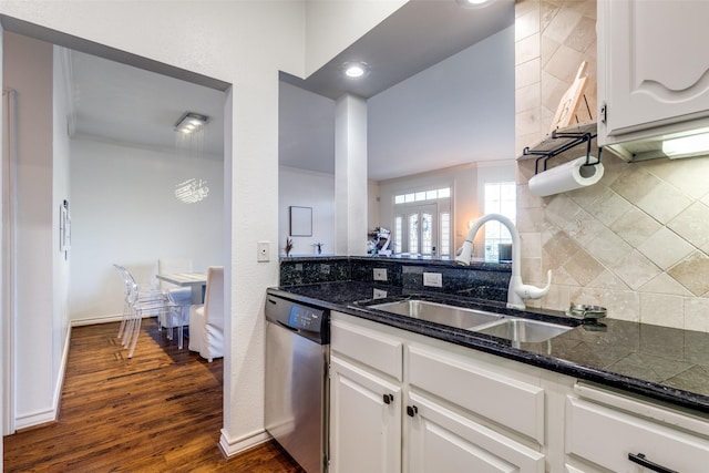 3208 Cole Ave Unit 1110, Dallas, TX 75204 - kitchen featuring dishwasher, backsplash, dark wood finished floors, and white cabinetry