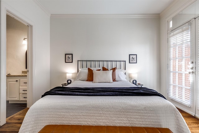 3208 Cole Ave Unit 1110, Dallas, TX 75204 - bedroom with ornamental molding, wood finished floors, and connected bathroom