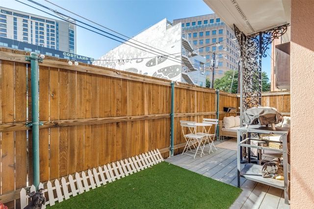 3208 Cole Ave Unit 1110, Dallas, TX 75204 - view of yard with a wooden deck