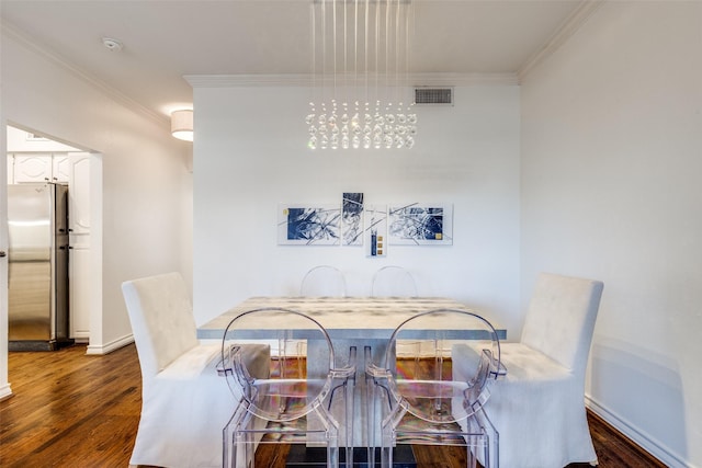 3208 Cole Ave Unit 1110, Dallas, TX 75204 - dining area featuring ornamental molding, dark wood-style flooring, and a chandelier
