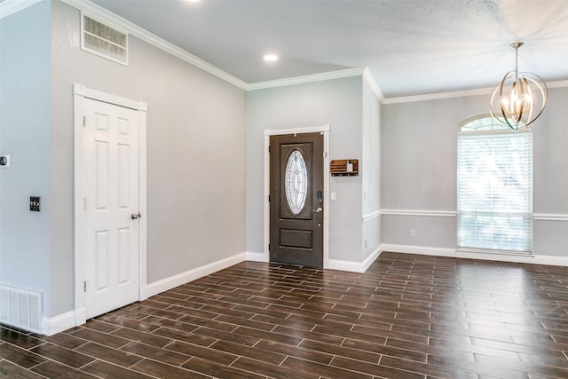 3713 Brentwood Ct, Colleyville, TX 76034 - foyer entrance featuring wood finish floors, a chandelier, ornamental molding, and recessed lighting
