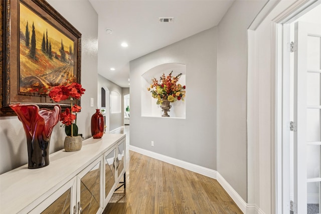 1344 Mountain View Ln, Kennedale, TX 76060 - hall with light wood finished floors, recessed lighting, and arched walkways