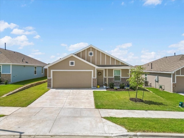 2525 Bunkerton Dr, Fort Worth, TX 76179 - craftsman inspired home featuring brick siding, a garage, driveway, and a front lawn