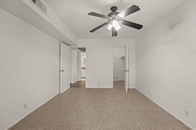 5305 Fleetwood Oaks Dr Unit 274, Dallas, TX 75235 - unfurnished bedroom with carpet floors, ceiling fan, and a spacious closet