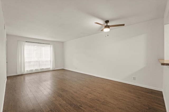 5305 Fleetwood Oaks Dr Unit 274, Dallas, TX 75235 - empty room with dark wood-style floors and ceiling fan