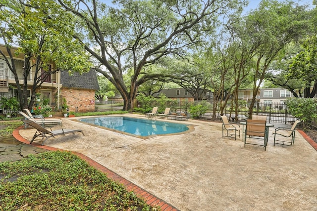 5305 Fleetwood Oaks Dr Unit 274, Dallas, TX 75235 - view of swimming pool with a patio area