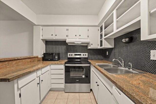 5305 Fleetwood Oaks Dr Unit 274, Dallas, TX 75235 - kitchen with electric range, under cabinet range hood, black microwave, white cabinetry, and light tile patterned floors