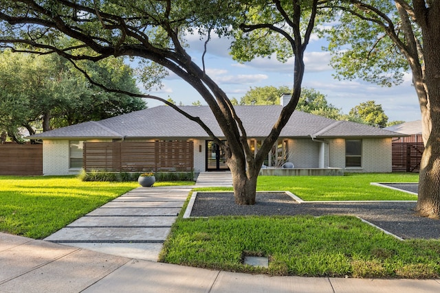 7339 Meadow Oaks Dr, Dallas, TX 75230 - view of front of house featuring brick siding and roof with shingles