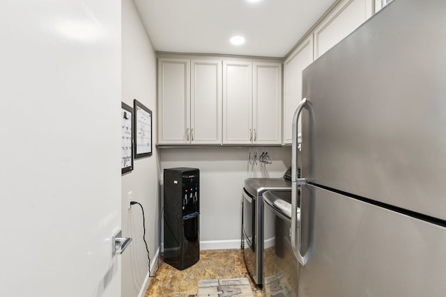 7339 Meadow Oaks Dr, Dallas, TX 75230 - laundry area featuring washing machine and clothes dryer, cabinet space, and recessed lighting