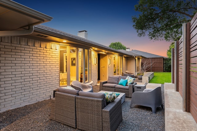 7339 Meadow Oaks Dr, Dallas, TX 75230 - patio terrace at dusk with an outdoor living space and a patio