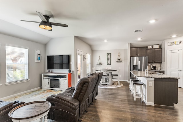 702 Stampede Ln, Princeton, TX 75407 - living room featuring vaulted ceiling, a ceiling fan, dark wood-style floors, and recessed lighting