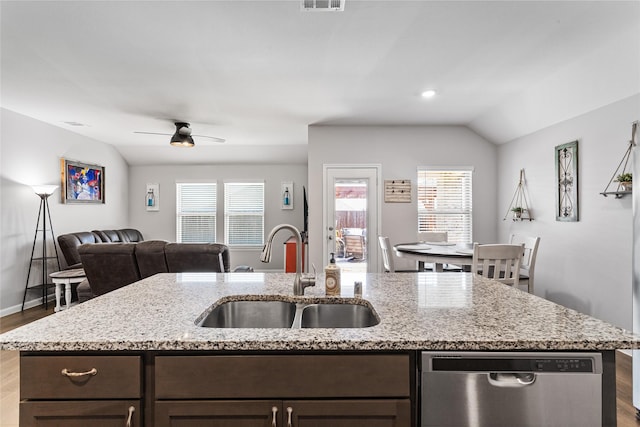 702 Stampede Ln, Princeton, TX 75407 - kitchen featuring dishwasher, dark brown cabinets, wood finished floors, a ceiling fan, and vaulted ceiling