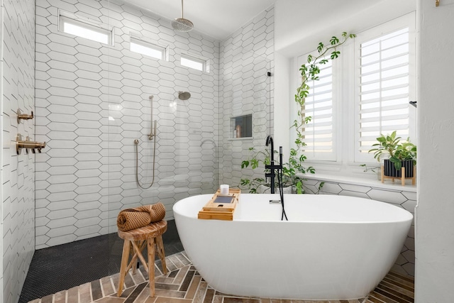 2223 Galloway Blvd, Trophy Club, TX 76262 - full bathroom with walk in shower, a soaking tub, and tile walls
